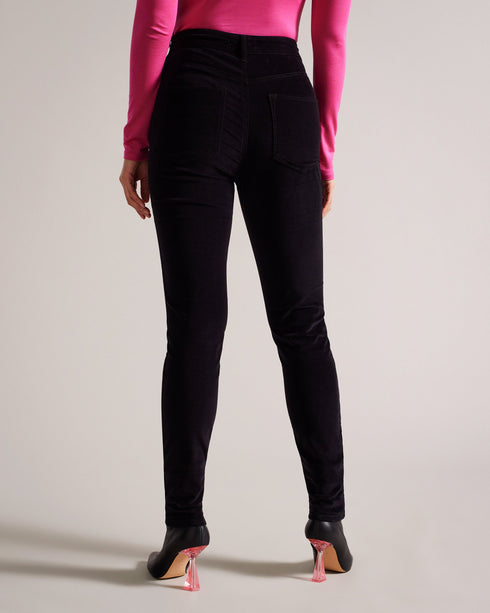 LIVVIAH-Denim-Not your everyday jeans, LIVVIAH are the perfect way to add a bit of intrigue to your wardrobe. Boasting a high waist and skinny fit, these jeans have a velvety finish that takes the meaning of jeans to a whole new level. Skinny jeans Velvet finish High rise Zip and button fastening Belt loops Pockets Chae is 5'9.5" / 1.77m and wears Black in 24"- Ted Baker Romania
